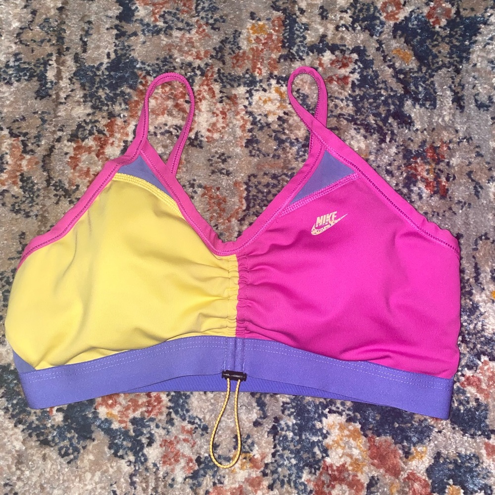Nike sports bra in fun retro tri colored print. Front draw string.